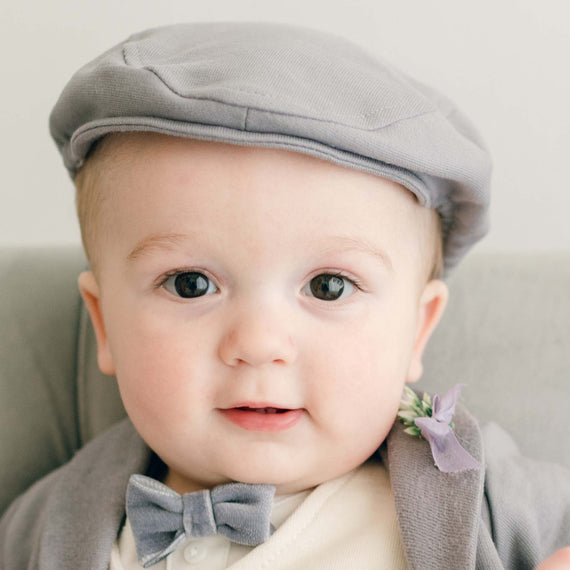 Baby boy wearing the Ezra Heather Newsboy Cap made from French terry cotton 