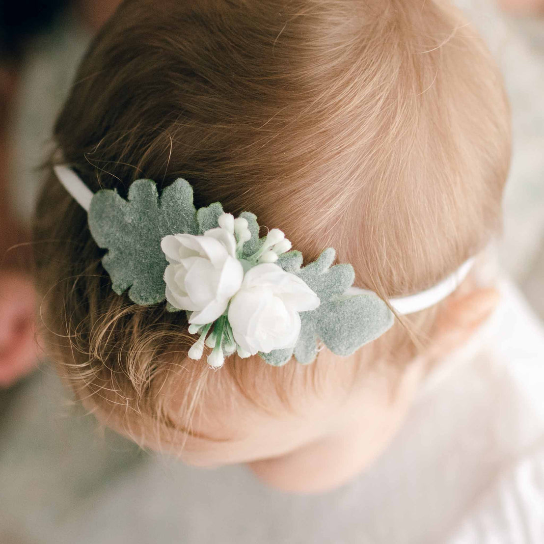 Closeup of the Ella baby girl flower headband