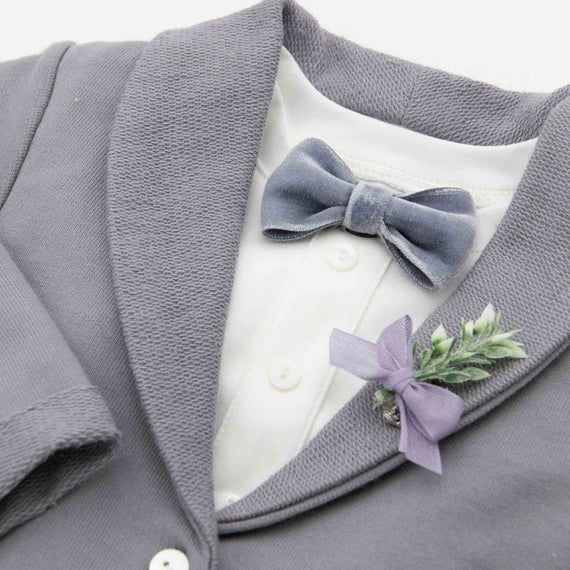 Flat lay photo of the Ezra French Terry Jacket with attached velvet bow tie and boutonniere 
