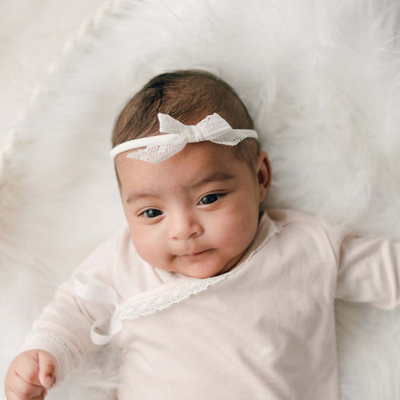Baby girl in lace bow headband