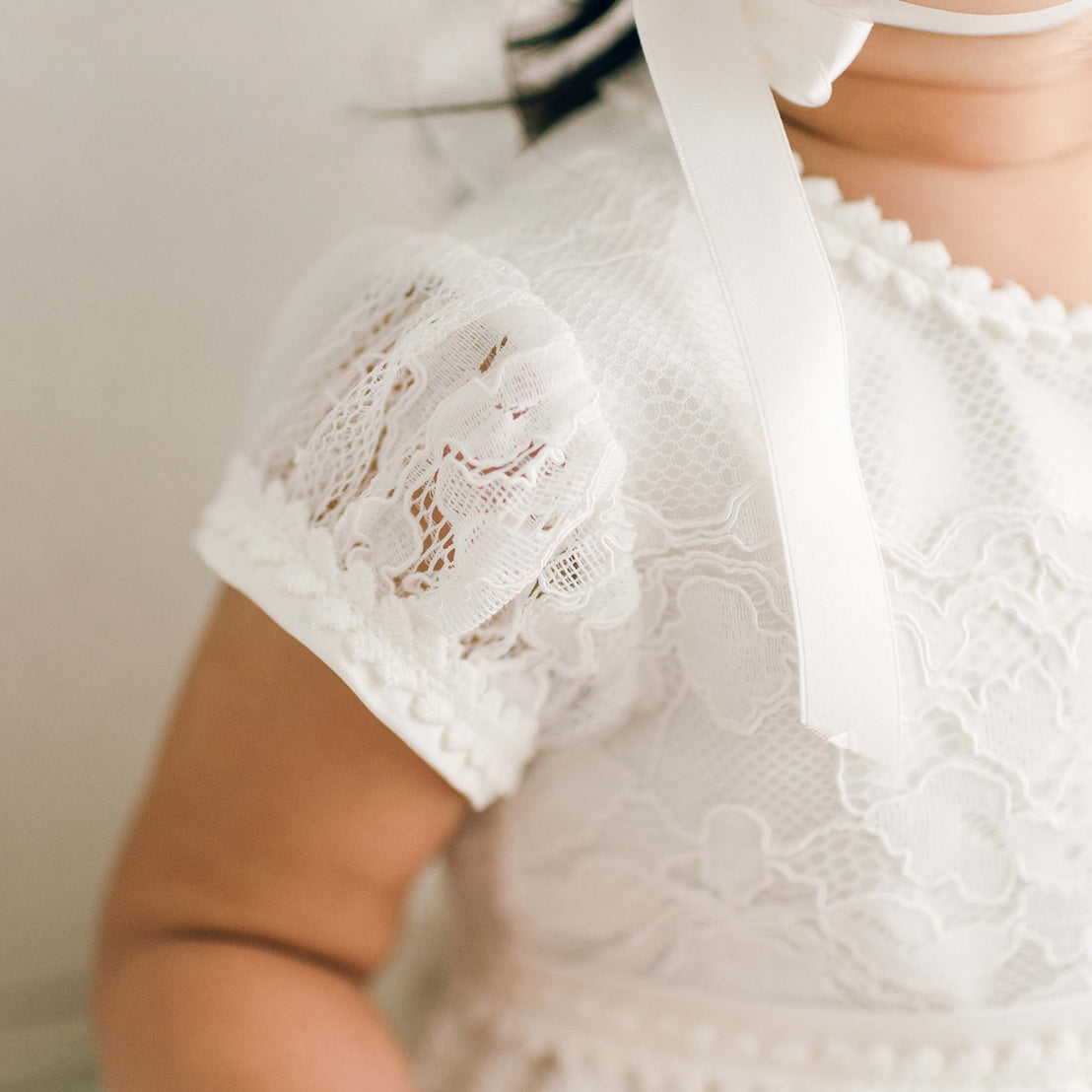 Close up of puff sleeve on the Victoria Christening Gown.