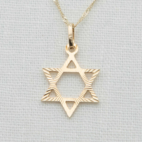 Solid gold Star of David with striping design on chain