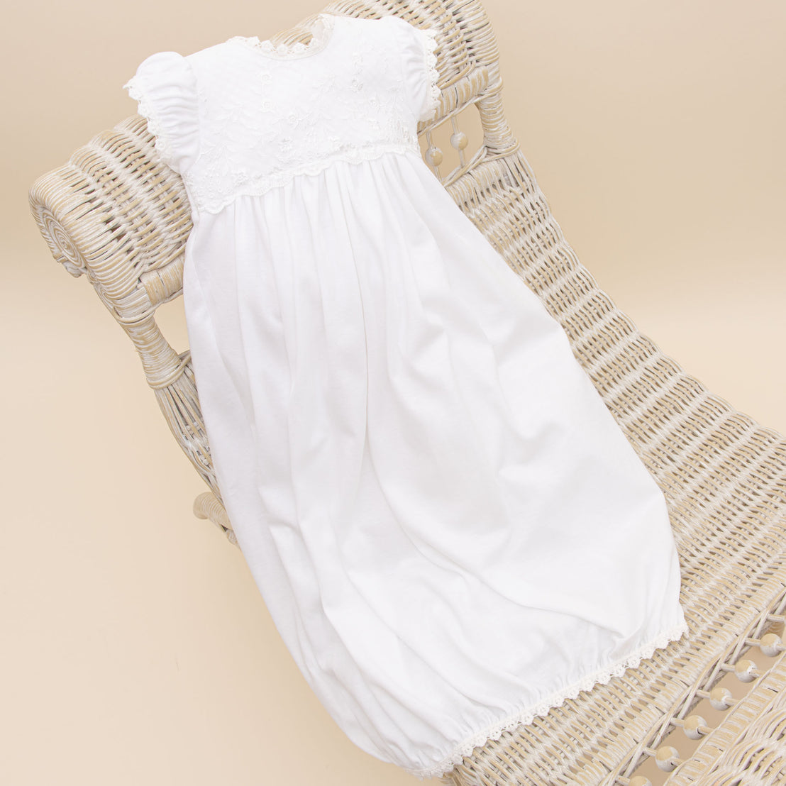 Full photo of the Ella Layette on chair