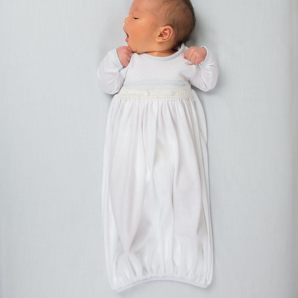 Newborn baby wearing the Harrison Newborn Gown