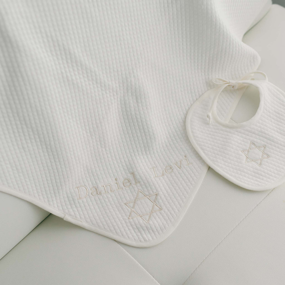 Star of David embroidery on ivory quilted cotton Bris bib and blanket