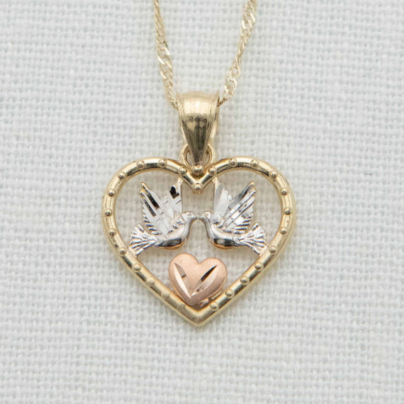  Gold heart with white gold doves and rose gold heart detail on chain