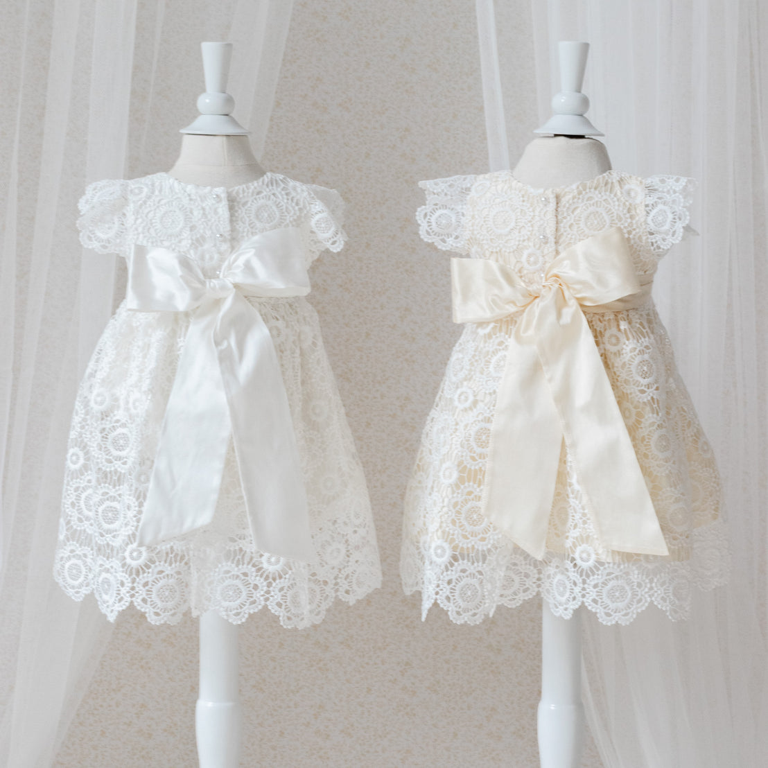 Poppy lace dress back silk color options on mannequins against a neutral background