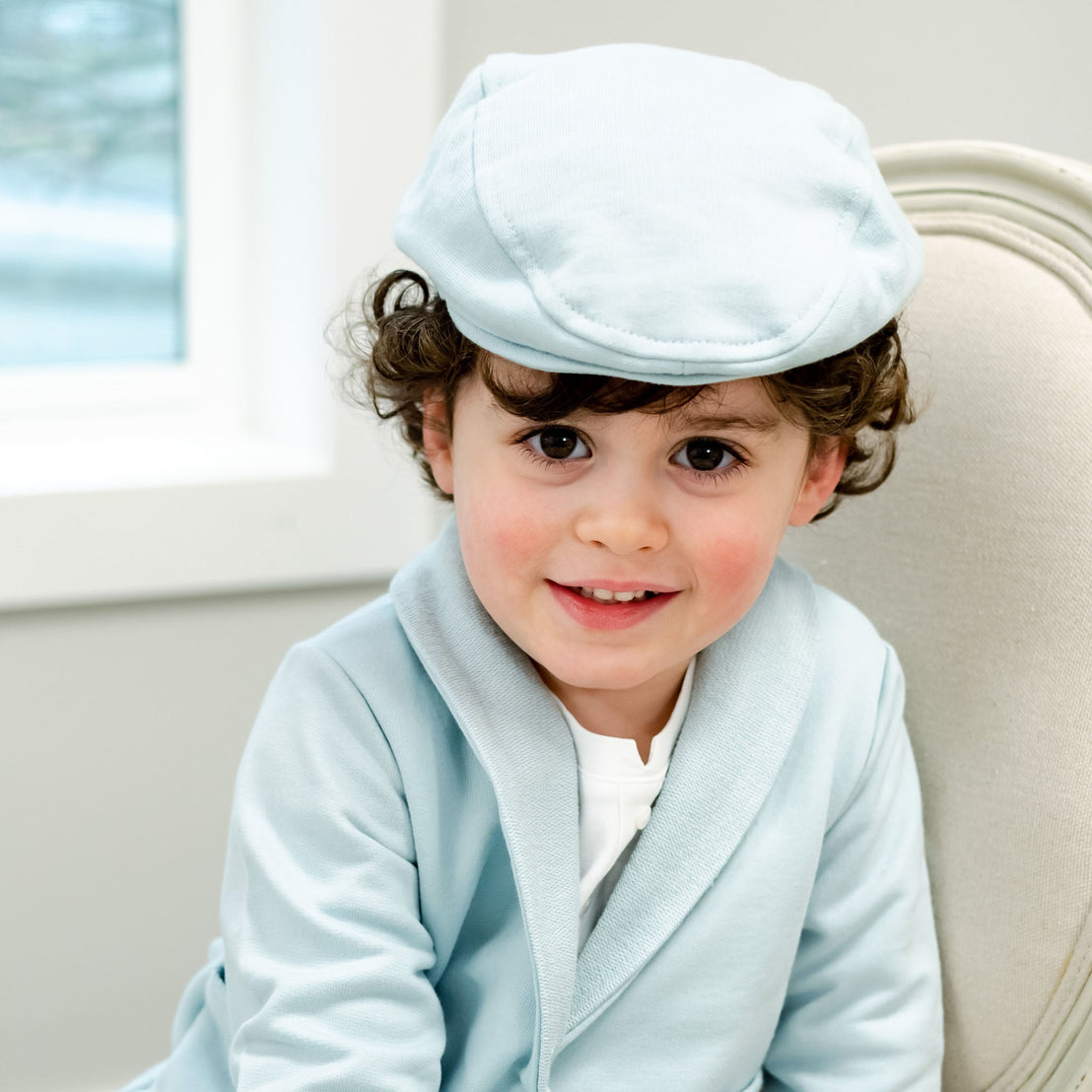 Toddler boy in robin's egg blue cotton newsboy cap