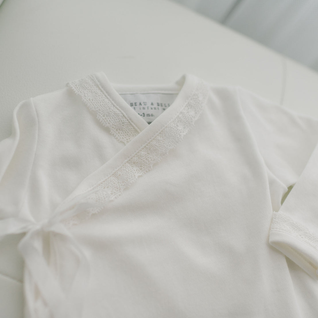 Lace detail on baby cotton gown