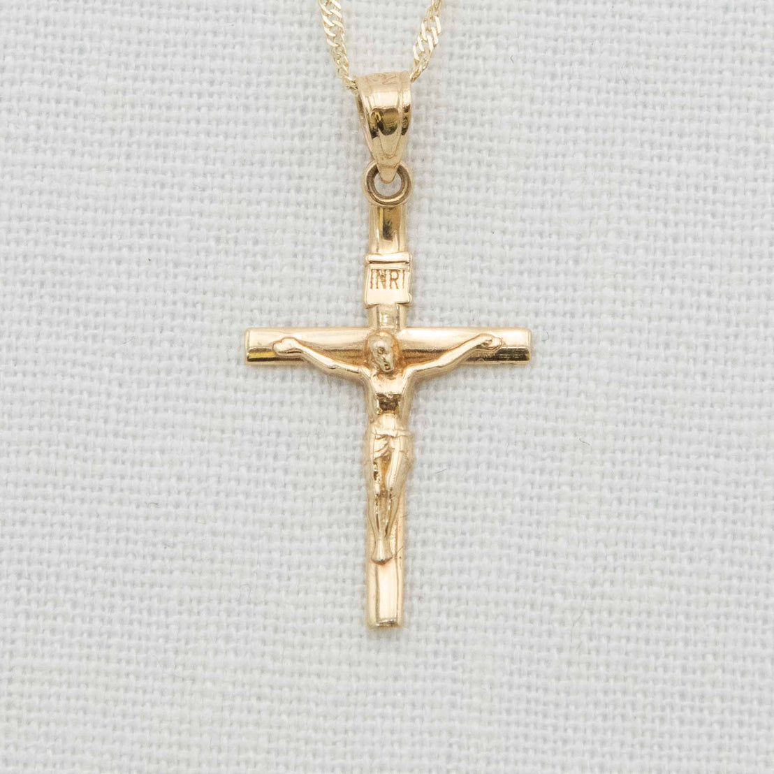 Gold crucifix necklace