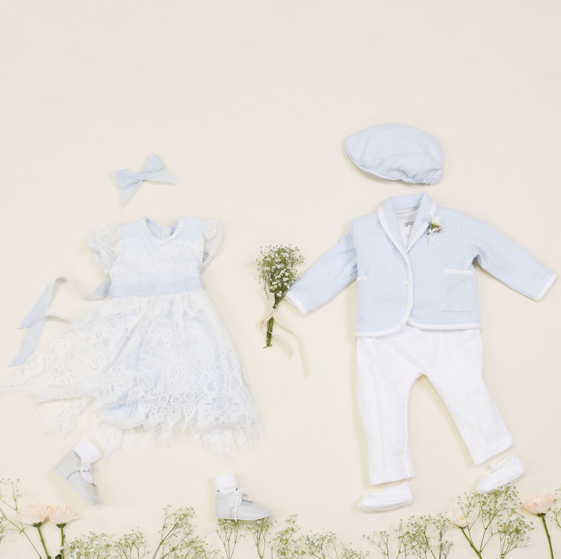 Flat lay comparison of the Logan 3-Piece Suit (and matching Newsboy Cap and Booties) with a Baby Girl Dress.