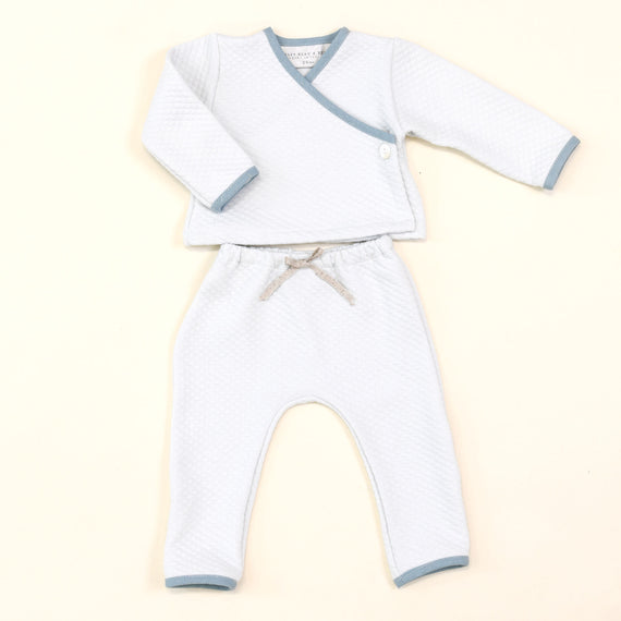 Baby's upscale two-piece outfit consisting of Aiden Quilted Wrap Top and Pants, displayed on a light beige background.