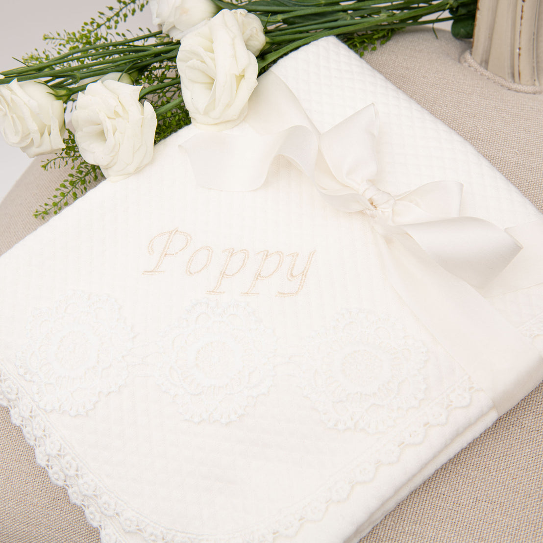  Poppy personalized blanket wrapped in a beautiful bow. 