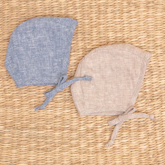 Flat lay photo of two Silas Linen Bonnet, including the colors indigo and sand